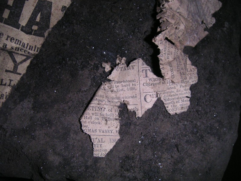 sc_topof_sc_flats_newspaper4.jpg - Close up of the newspaper, here you can see the date of a forth coming event, Dec, 21st 1886. The only date confirmation we could fine.