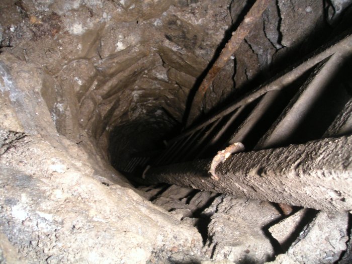 oreshaft_from_stope.jpg - This is looking down the laddered ore shoot from the stope that we found along the Middlecleugh Second Sun Vein past the Bogg's Shaft junction.