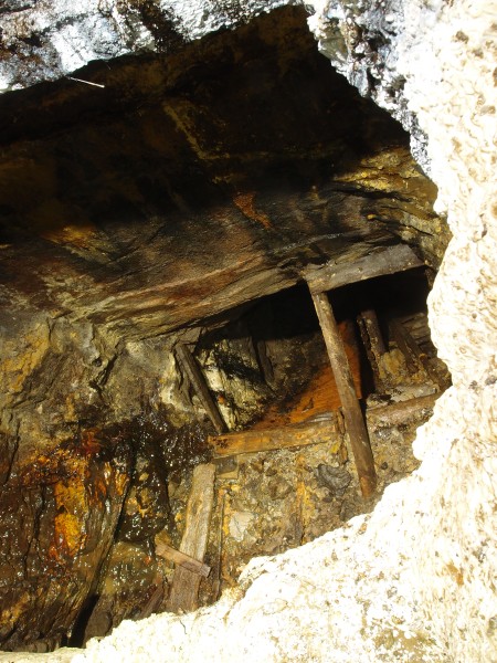 PC028619.JPG - Looking down the hole in the sublevel to the dual sump.