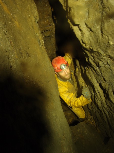 PC028631.JPG - Climbing back out from the understope past the flake - on right.