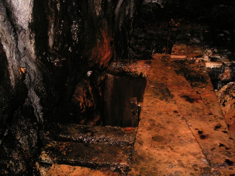 sc_stopewestofboggshaft_manway_1.jpg - The top of the manway leading to a stope west of Bogg Shaft, accessed via the horse level on Longcleugh Vein. This is taken with diffused halogen lighting.