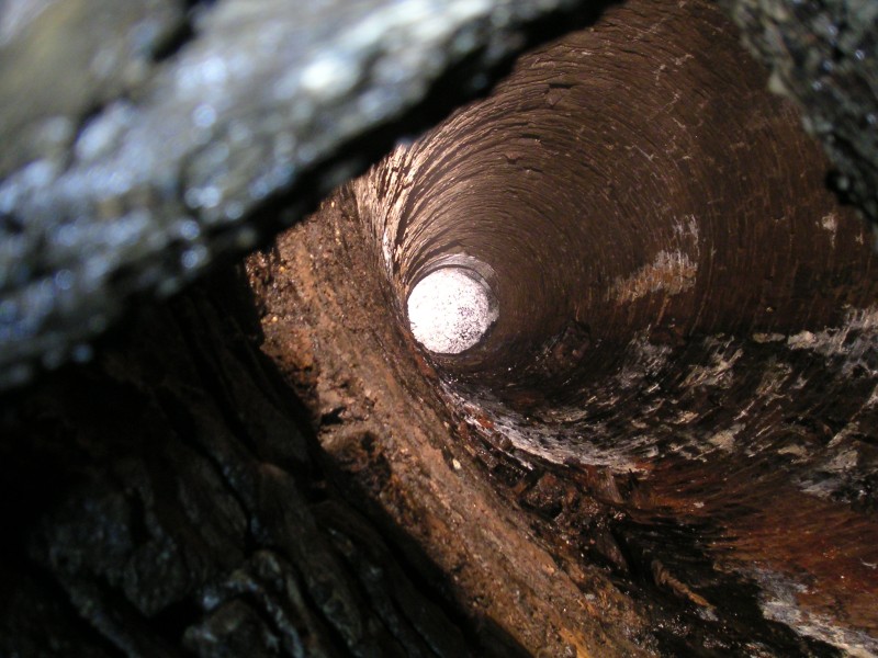 sc_barrons_sump2.jpg - Having been here a few times, the actual sump had never been photographed, this is looking down in between some timbers.