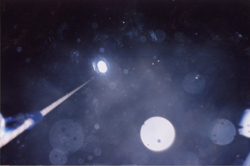 surfaceshaft4.jpg - At the bottom and looking up, the light looks along way away when your down there. This was done in high summer yet Mike came back up totally soaked.