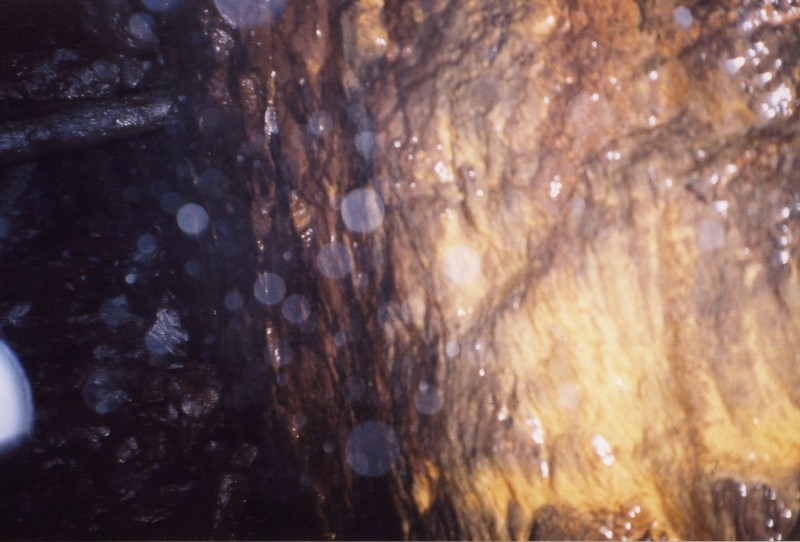 surfaceshaft5.jpg - Some flow stone at the bottom.