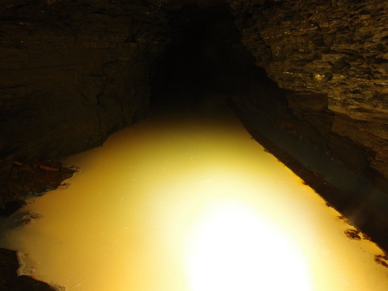 P6113820.JPG - Calcite on the water - lit from below. This is in the level that connects to the North End Level.