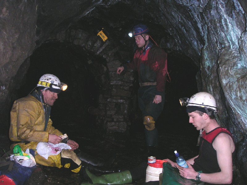 ccl_lunch.jpg - Coming out of the horse level you come to this main junction, the driest spot for a while - perfect for lunch. I had scoffed my goodies down quickly and proceeded to take more pics. Karli had a 7mm wetsuit, and was cooling down.