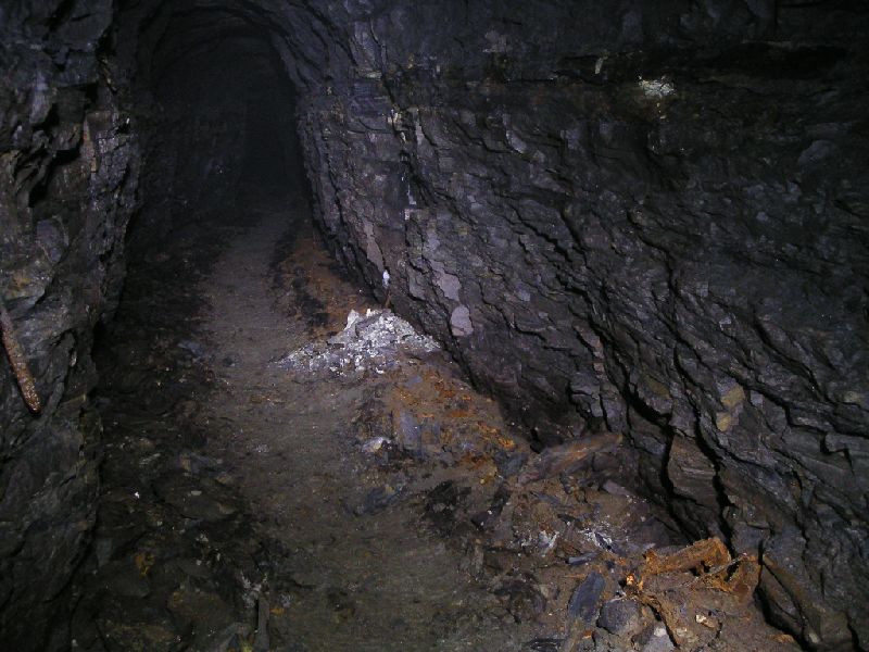 middlecleugh_chxv_trunkingrems2.jpg - In the branch that leads to the Cow Hill Cross Vein, the remains of wooden ventilation trunking can be seen on the floor.