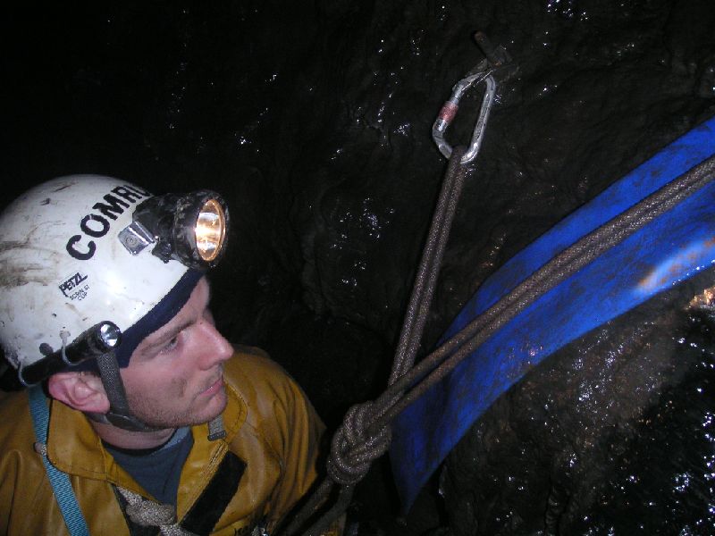 sb_levelbelowtopsills_sump2bhrigging.jpg - Karli starting to abseil down the sump to Brownley Hill.