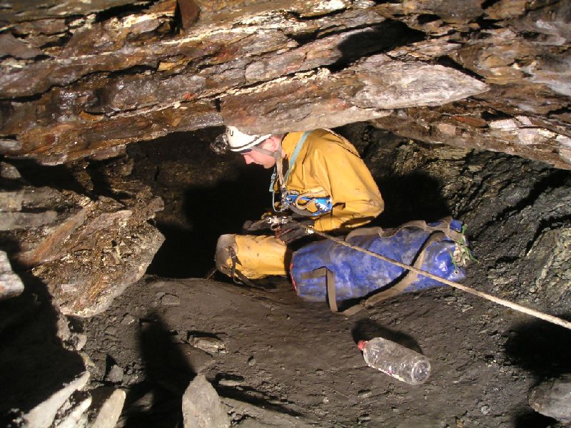 scaleburn_barronsumprigging2.jpg - Karli preparing to abseil Barron's Sump at the end of the Top Sill's Level.