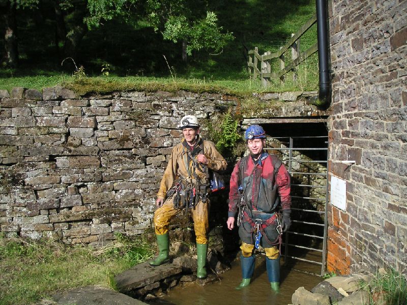 sc_to_rg_exit.jpg - Finally exiting into the bright sunshine. Just as taking this picture Charlie came driving past (impeccable timing) and gave us a lift up to Smallcleugh to retrieve the ropes - ah... the joy of going down again.