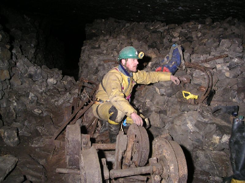 sc_proudsworking1.jpg - Ore truck wheels and artifacts.