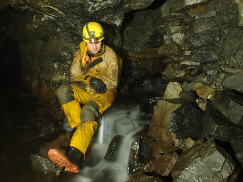 PA043176.JPG - Water flowing out from under the arching and hopper, left at the 3 way junction on Tynebottom B / Tynebottom Sun Vein Level.