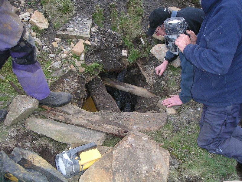 olrb_diggingtoclearwater2.jpg - Clearing mud to lower the water.